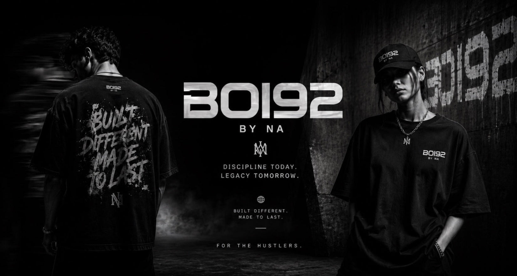 A promotional black-and-white image for BO192 by NA, showing two models wearing the brand's black t-shirt. The left model shows the back of the shirt with white distressed text, and the right model shows the front with a small white chest logo.